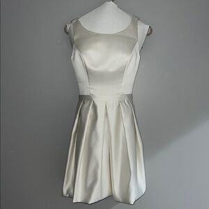 Enchanting Mon Cheri Elegant Ivory Sleeveless Dress